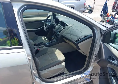 2014 Ford Focus Se z USA, uszkodzony, nr VIN 1FADP3F2XEL204016